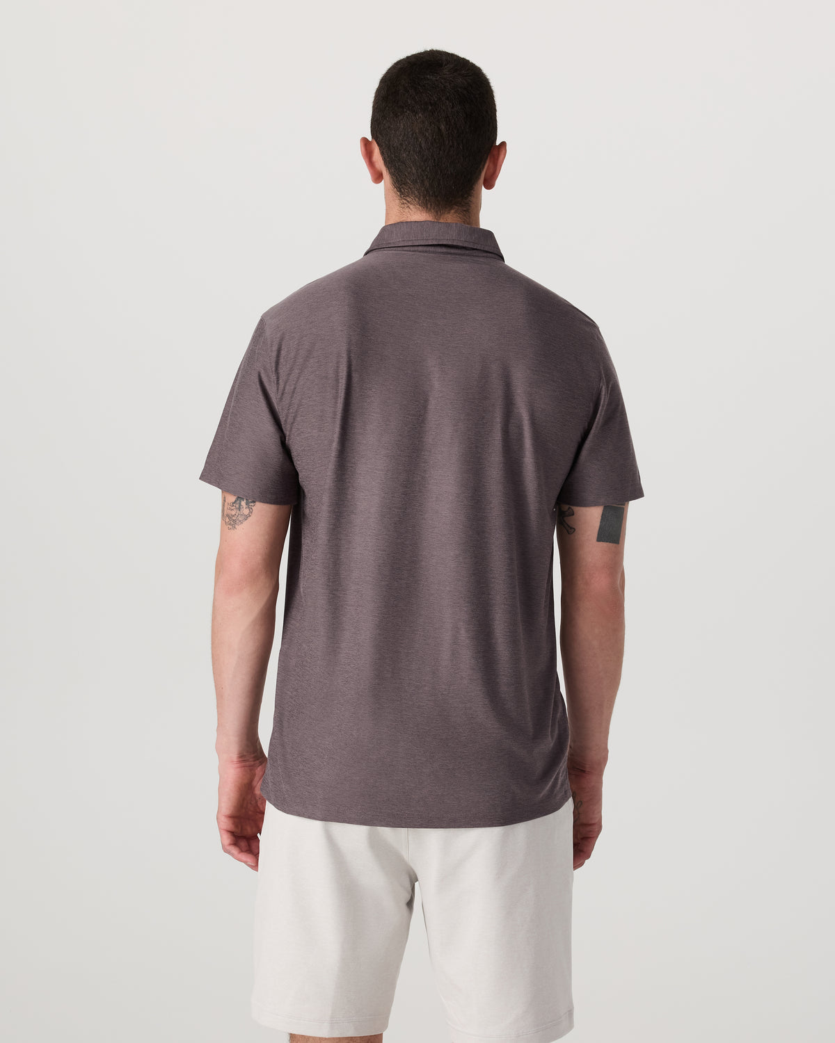 Men Vuori Strato Tech Polo Men's Huckleberry Heather Polo Shirt